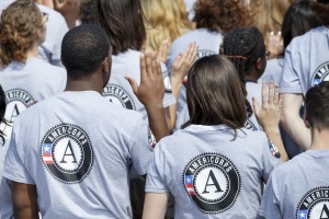 Hundreds of new volunteers are sworn in for duty at a ceremony, Friday, Sept. 12, 2014, on the South Lawn of the White House in Washington, marking the 20th anniversary of the AmeriCorps national service program. (AP Photo/J. Scott Applewhite)