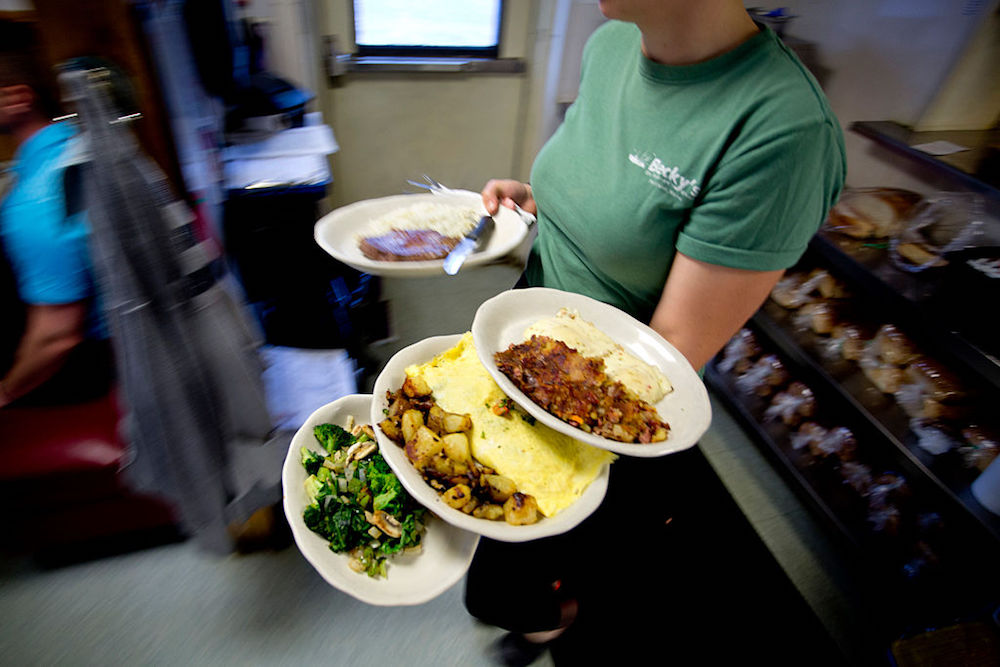 waitress balancing plates