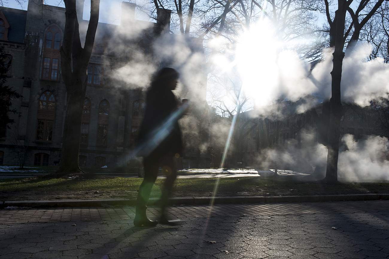 Student walking on Philadelphia college campus